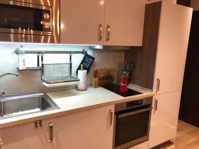 a kitchen with a sink and a counter top at Center apartment with amazing view in Sofia