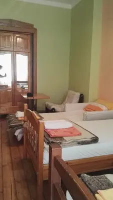 a room with a group of beds in it at Hello Sofia Guesthouse in Sofia