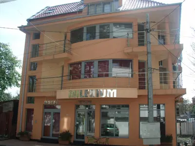 a building with a sign that reads melatonin at Hotel Milenium in Sofia