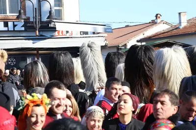 a large group of people standing in a crowd at Hotel Alpin - 91 Bansko in Bansko