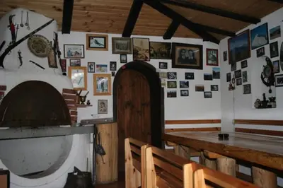 a room with a woodenasteryasteryasteryasteryasteryasteryasteryasteryasteryasteryastery at Guest House Chicho Tsane in Bansko