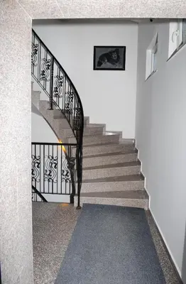 a stairway with a black and white staircase at Студия Давидов 