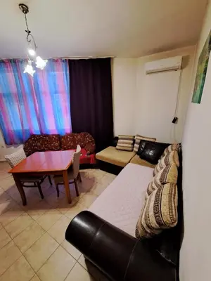 a living room with a couch and a table at relax in Plovdiv