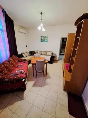 a living room with a couch and a table at relax in Plovdiv