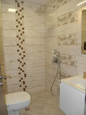 a bathroom with a toilet and a sink at ApArt apartments in Plovdiv