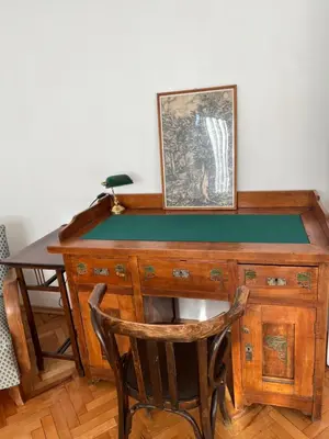 a desk with a ping pong table in a room at Apartment August 11 in Sofia
