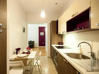 a kitchen with a sink and a counter top at Solunska Apartment in Sofia