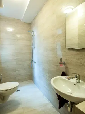 a bathroom with a sink and a toilet at Solunska Apartment in Sofia