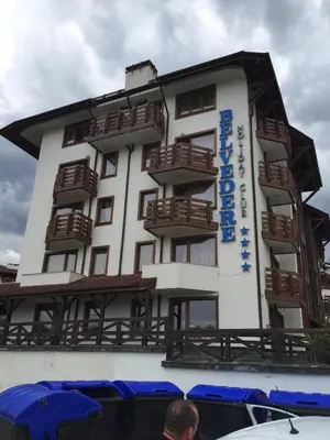 a building with balconies on the side of it at Belvedere holiday apartment in Bansko