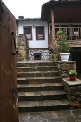a set of stairs leading to a house at Complex Kosovo Houses in Kosovo