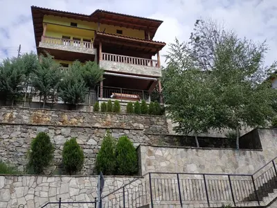 a building on top of a stone wall at 