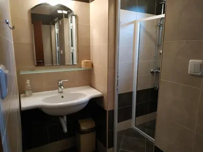 a bathroom with a sink and a shower at 