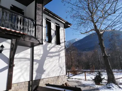 a house with a view of the mountains at Complex Magic of the Rhodopes in Bachkovo