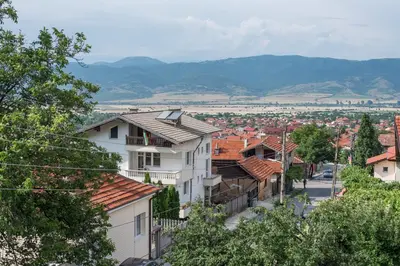 a view of a town with houses and trees at Apartment Raya in Sapareva Banya