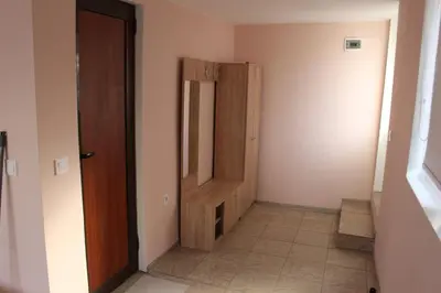 a hallway with a closet and a door in a room at Apartment Raya in Sapareva Banya