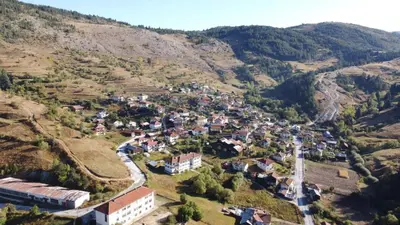 an aerial view of a small village in the mountains at Къща за гости Романс in Yagodina