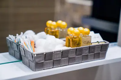 a basket of utensils on a table at Sofia Central Luxury Apartment in Sofia