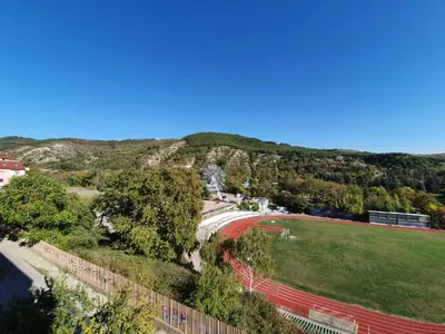 an aerial view of a race track in a field at Д и В 2 - D & V 2 Apartment in Sandanski
