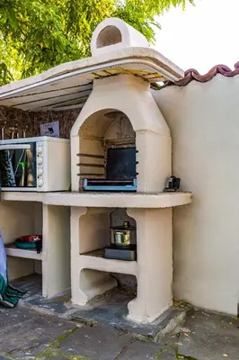 a bird house with a tv on top of it at Blacksmith's House - Old Town in Plovdiv
