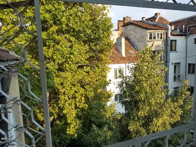 a view from the balcony of a building with trees at Artistic studio in Sofia's top center in Sofia