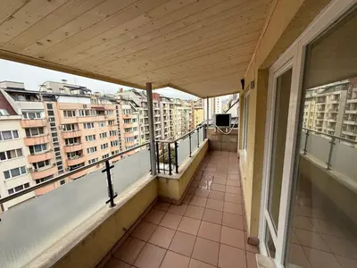 a balcony with a view of some buildings at Kamy-Sophia Apartment in Sofia