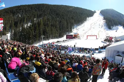 a large crowd of people watching a ski slope at Cozy Apartment Next to Gondola in Bansko