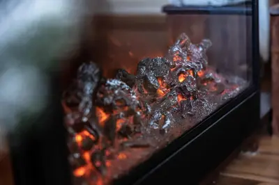 a pile of food cooking in a fireplace at Bansko home with a Mountain view in Bansko