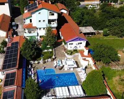 an aerial view of a house with solar panels at Complex Diana in Cherven