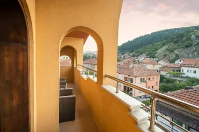 a balcony with a view of a city at Sky Garden House in Velingrad