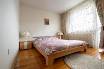 a bedroom with a bed and a window at Cosy, quiet house with Vitosha view near Paradise in Sofia
