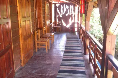 a walkway in a house with a moose on the wall at Семеен хотел Калина Family hotel Kalina Говедарци in Govedartsi