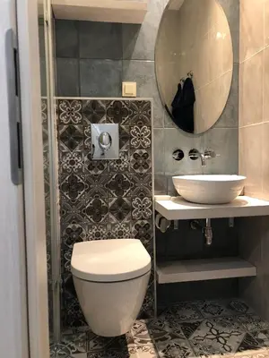 a bathroom with a toilet and a sink at Apartment 