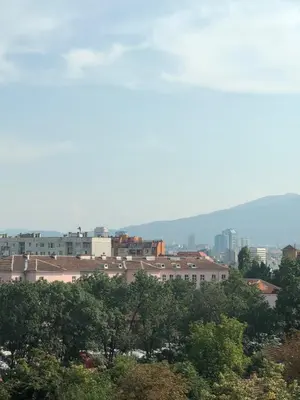 a view of a city with buildings and trees at Apartment 