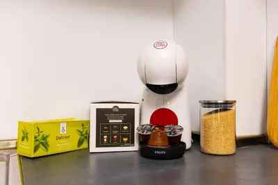 a blender sitting on a counter next to a box at Apartment Valerie walking distance to Top Center in Plovdiv
