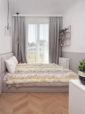 a bedroom with a large bed in front of a window at Hip, Cosmopolitan Gem in the Heart of Sofia by Flat Mаnager in Sofia