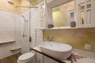 a white bathroom with a sink and a toilet at Temptation in Sofia - 24h Self Check-in in Sofia