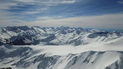 an aerial view of a snow covered mountain range at Great location near lift in Bansko