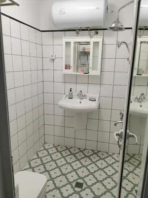 a bathroom with a sink and a toilet at Studio Oslo byPMM in Plovdiv