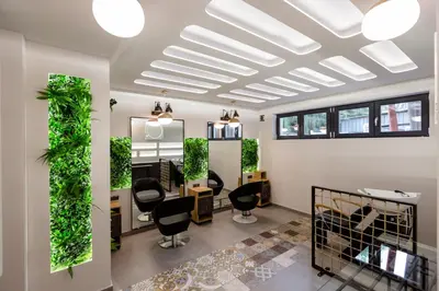 an office with plants on the walls and chairs at HOTEL FINIX CASINO in Kulata