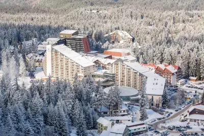an aerial view of a resort in the snow at Borovets Gondola Apartment & Ski by Winter Bros in Borovets