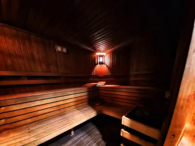 an empty sauna with a light in the middle at Balkan Hotel in Chiflik