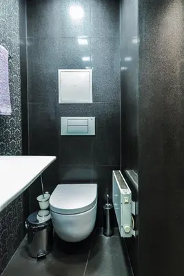a bathroom with a white toilet and a sink at Champs-Élysées Sofia 2-BDR, 2-BTHR Tsar Simeon Suite by Flat Mаnager in Sofia