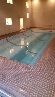 a large pool of water with at 7 Pools SPA Boutique Hotel in Bansko