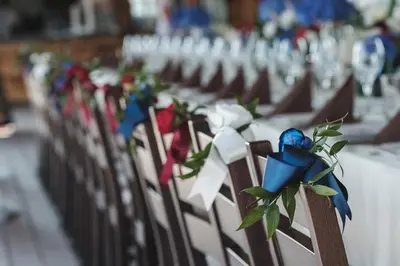 a row of chairs with flowers on them at Hotel Frigopan in Plovdiv
