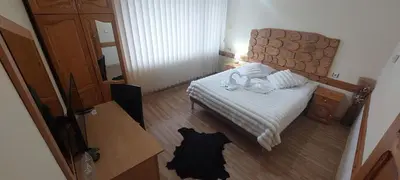 an overhead view of a bedroom with a bed at Guest House Planinski Zdravets in Bansko