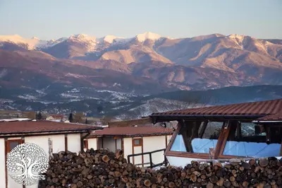 a view of a mountain range with mountains in the background at Debeli Dab in Stara Kresna