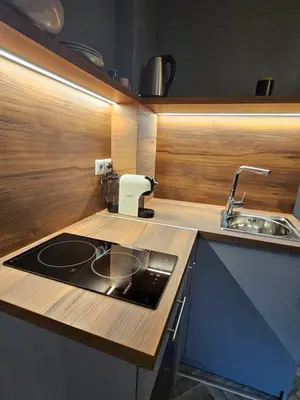 a kitchen with a sink and a counter top at Hot Spot Studio in the center in Sofia