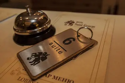 a metal tag sitting on top of a table at Family Hotel Saint George in Sofia