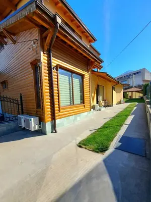 a house with a walkway in front of a house at Guest House Ideal in Sapareva Banya