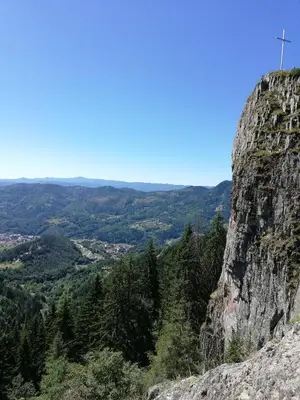 a cross on the side of a mountain at Grand Monastery - Azure Apartment in Pamporovo